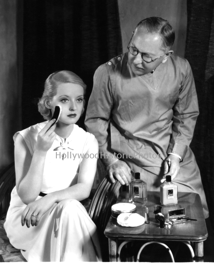 Bette Davis 1938 With Max Factor promoting Jezebel Eyes makeup.jpg